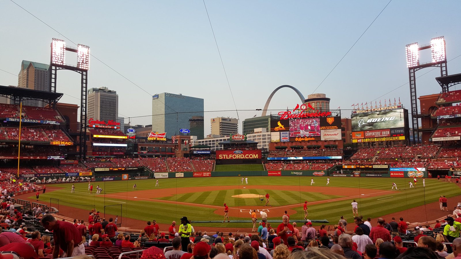 The arches high above Busch Stadium cast a long shadow over the playing  surface as the afternoon sun begins to fall during the Cincinnati Reds and  the St. Louis Cardinals game in